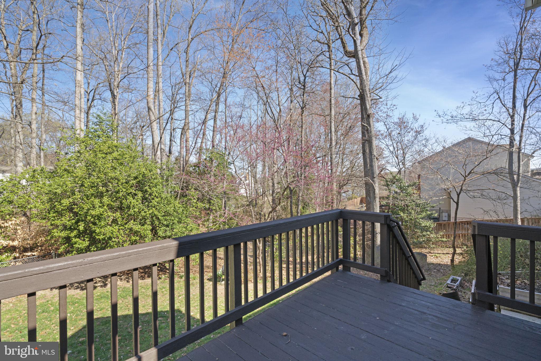18607 Cabin Road Triangle, VA 22172 - Photo 52 of 64 a view of a balcony with wooden fence
