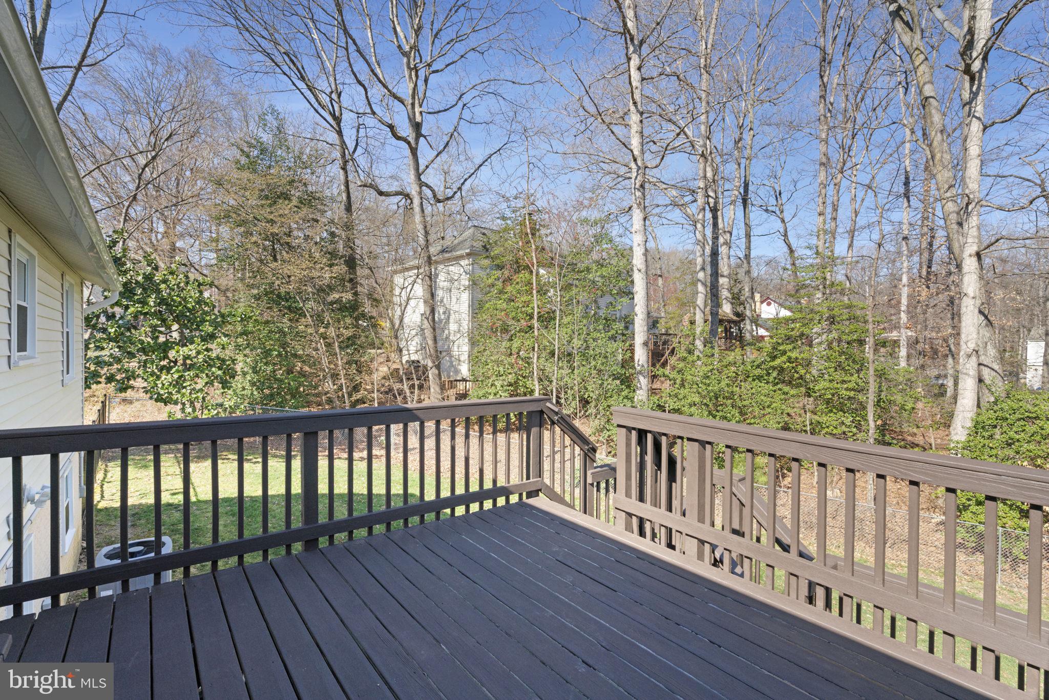 18607 Cabin Road Triangle, VA 22172 - Photo 53 of 64 a view of a wooden roof deck