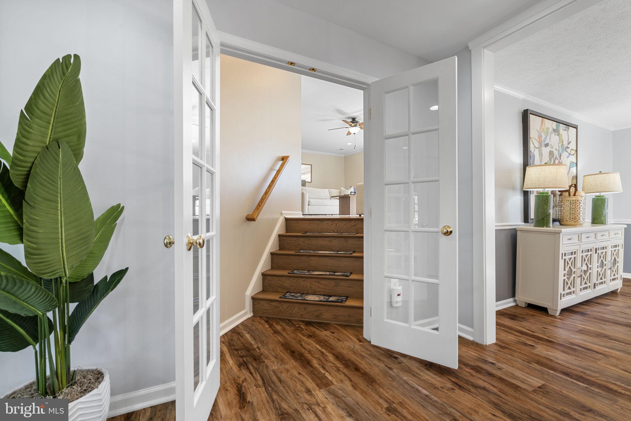 18607 Cabin Road Triangle, VA 22172 - Photo 6 of 64 a view of entryway with wooden floor and stairs
