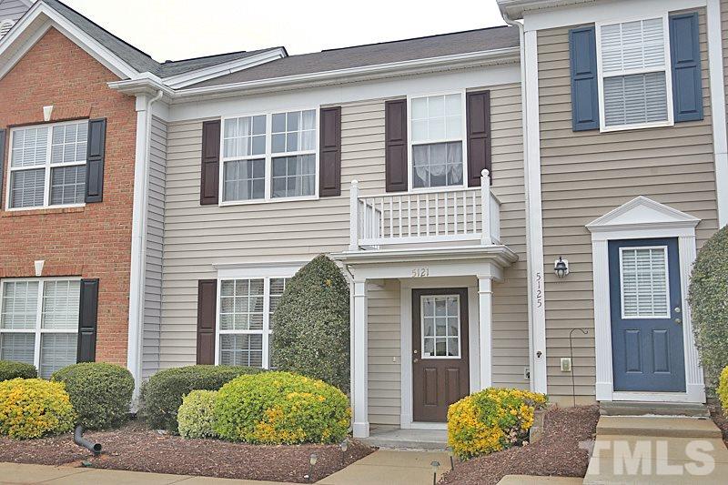 5121 Echo Ridge Road Raleigh, NC 27612 - Photo 1 of 16 a view of a brick house with a large windows