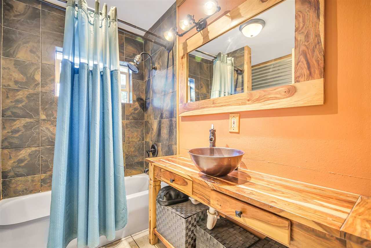 3301 F Road Clifton, CO 81520 - Photo 12 of 42 a bathroom with a sink and a mirror