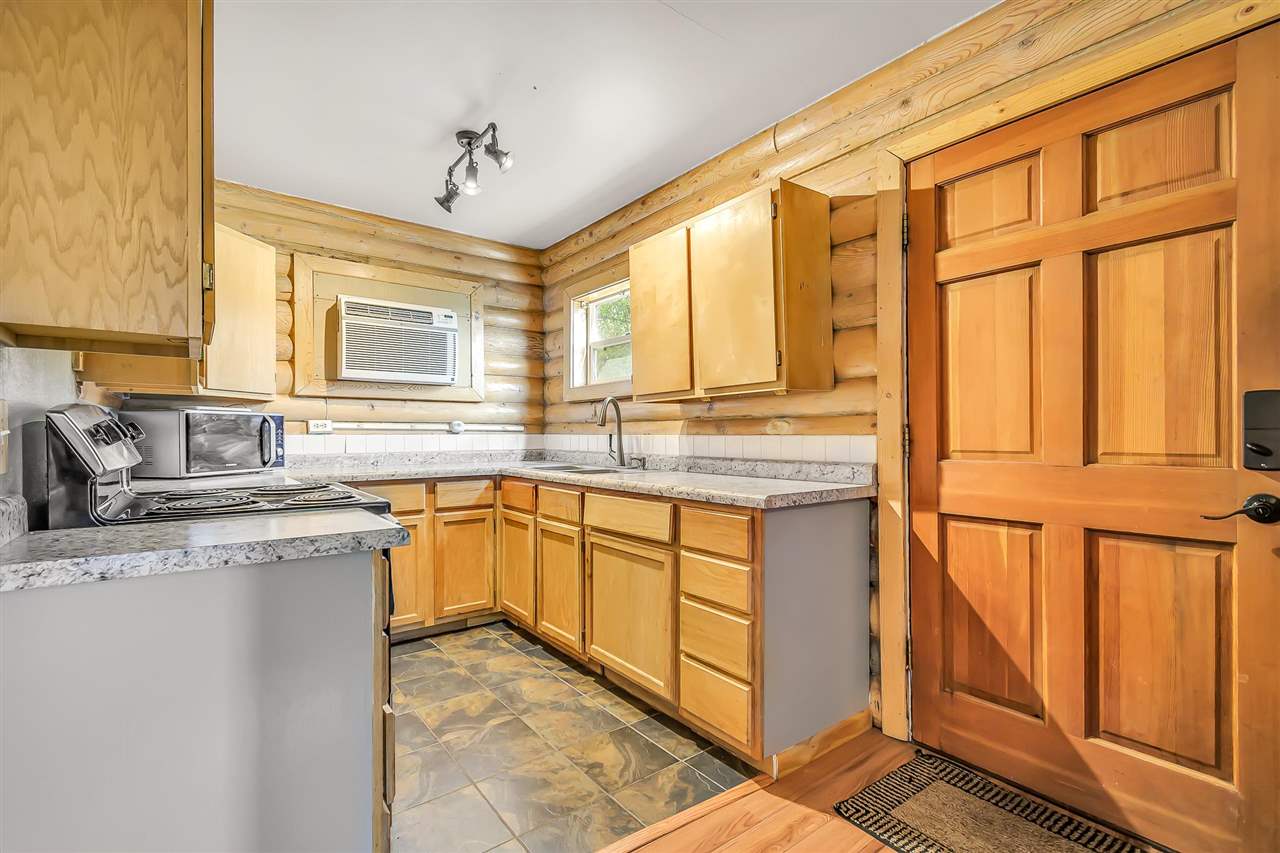 3301 F Road Clifton, CO 81520 - Photo 20 of 42 a kitchen with stainless steel appliances granite countertop a sink and cabinets