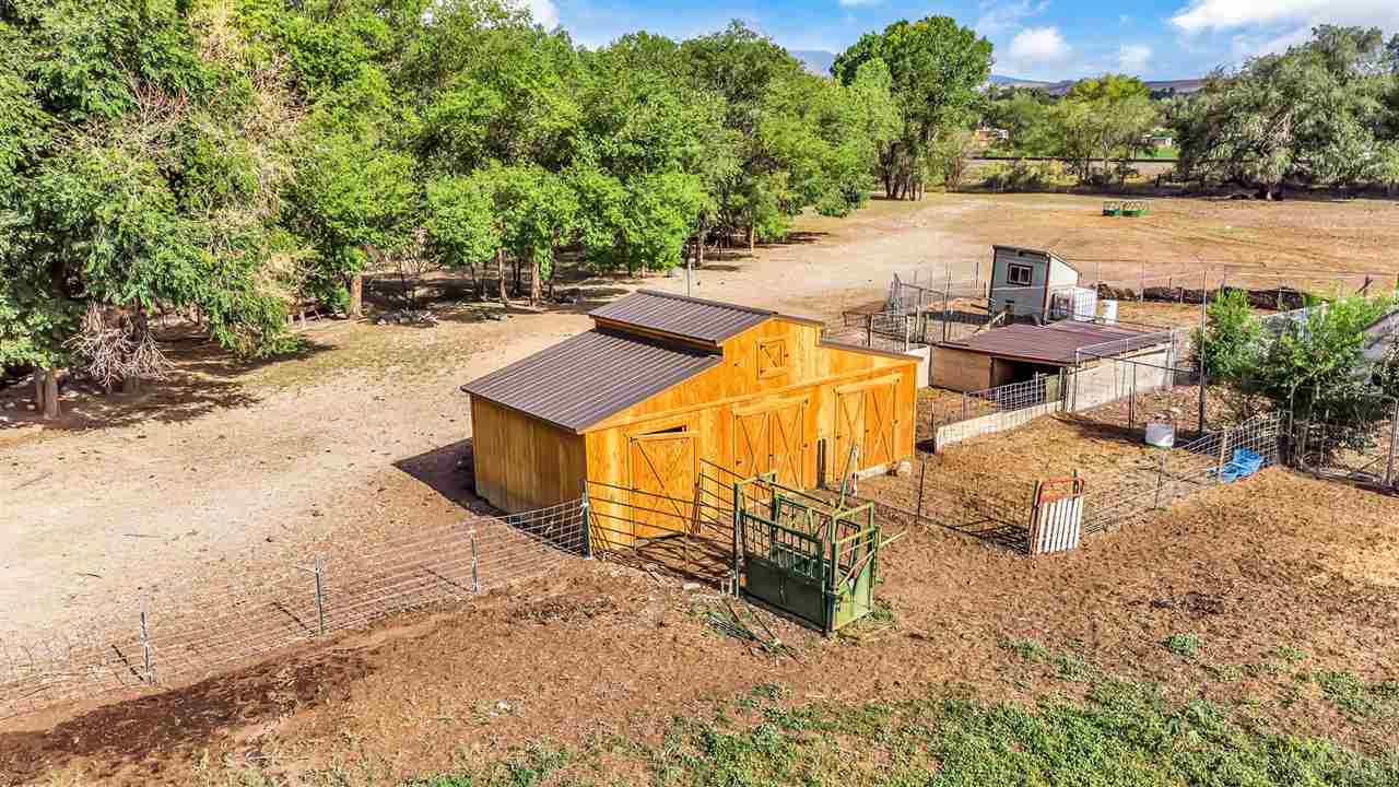 3301 F Road Clifton, CO 81520 - Photo 2 of 42 a view of a swimming pool with a patio