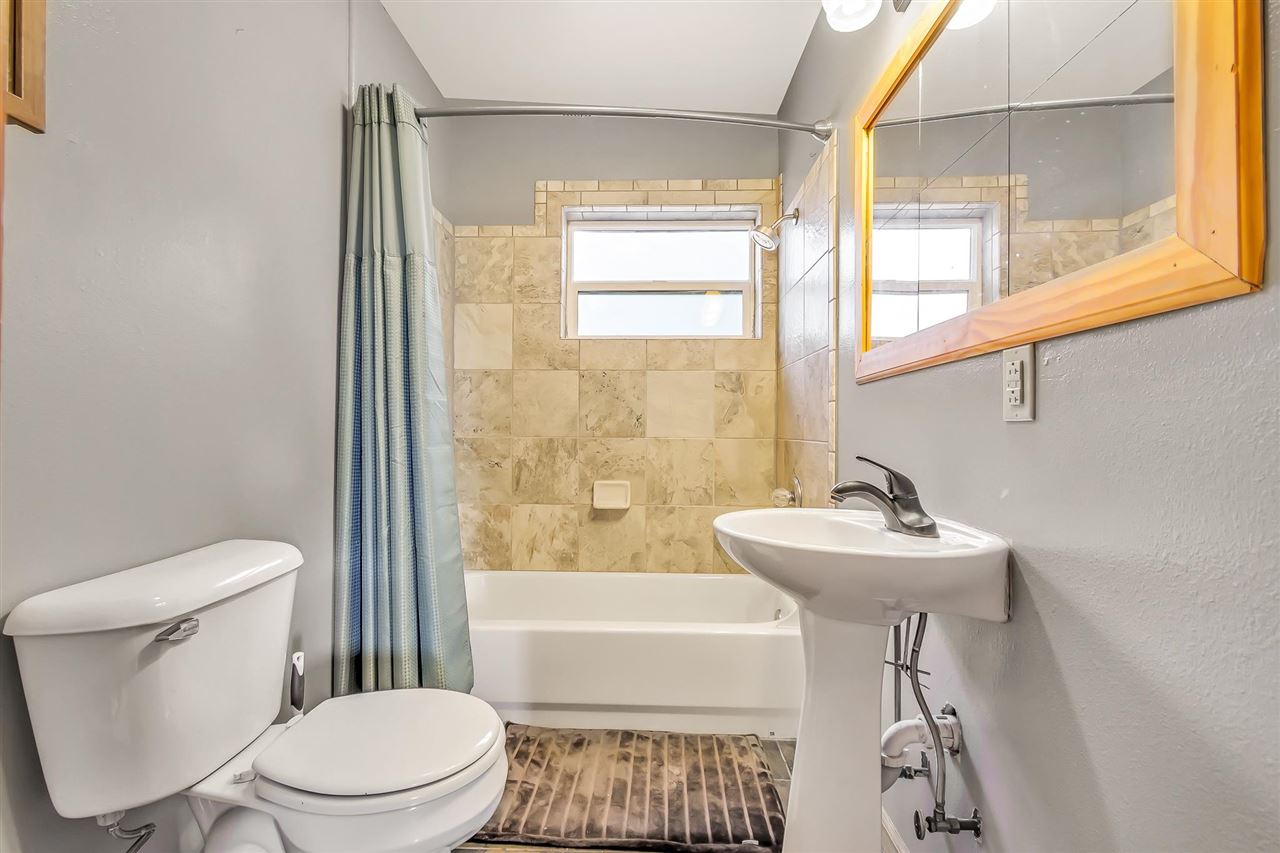 3301 F Road Clifton, CO 81520 - Photo 24 of 42 a bathroom with a sink a toilet and a bathtub