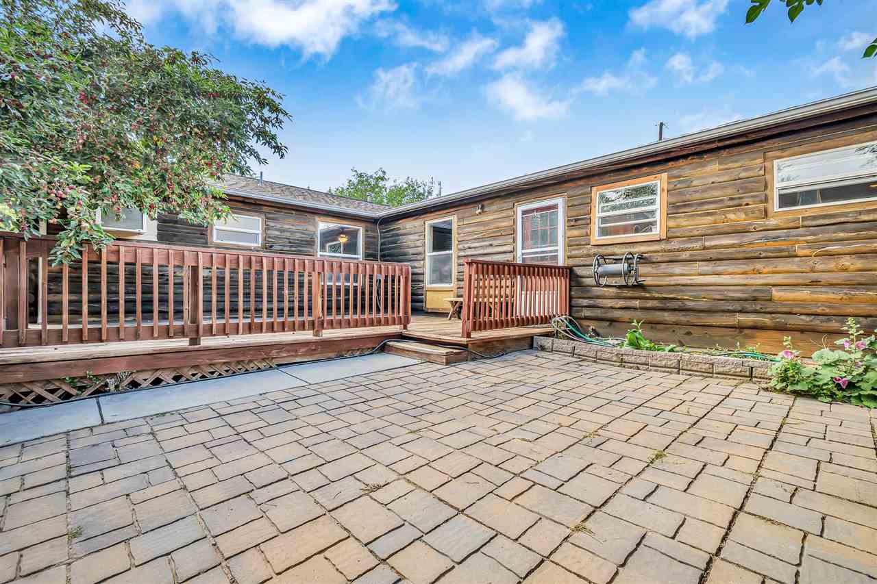 3301 F Road Clifton, CO 81520 - Photo 25 of 42 a view of backyard with wooden fence and trees