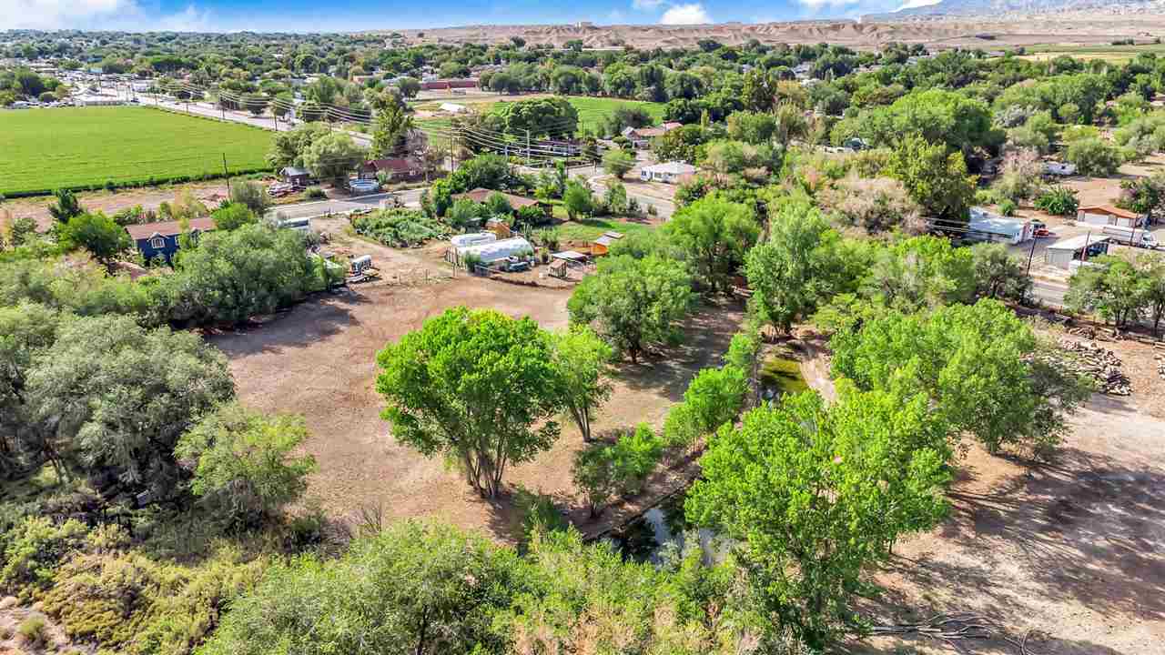 3301 F Road Clifton, CO 81520 - Photo 28 of 42 an aerial view of a houses with a yard