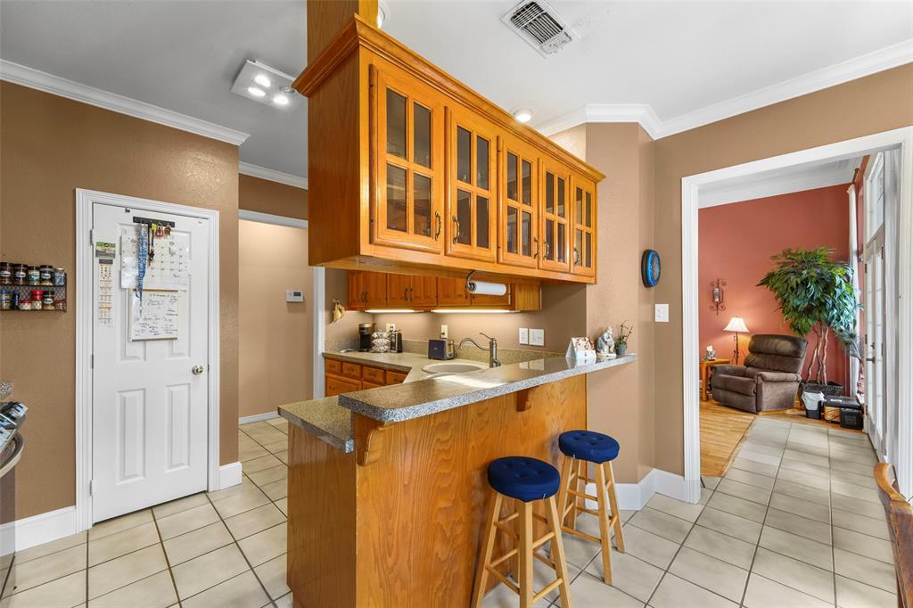 301 Elm Street Quinlan, TX 75474 - Photo 14 of 40 a view of a storage & utility room