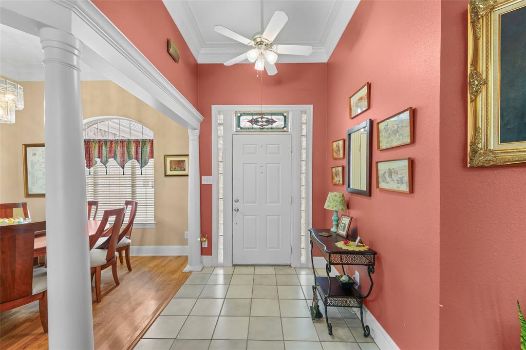 301 Elm Street Quinlan, TX 75474 - Photo 3 of 40 a very nice looking room with many windows and furniture