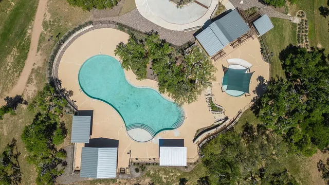 a view of a house with snow on the background