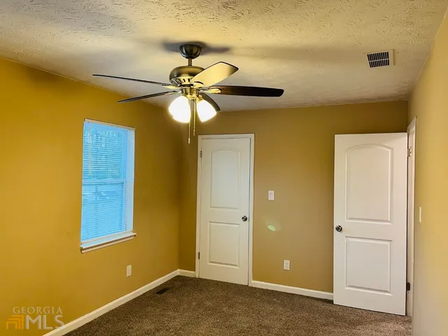 a view of a livingroom with a chandelier