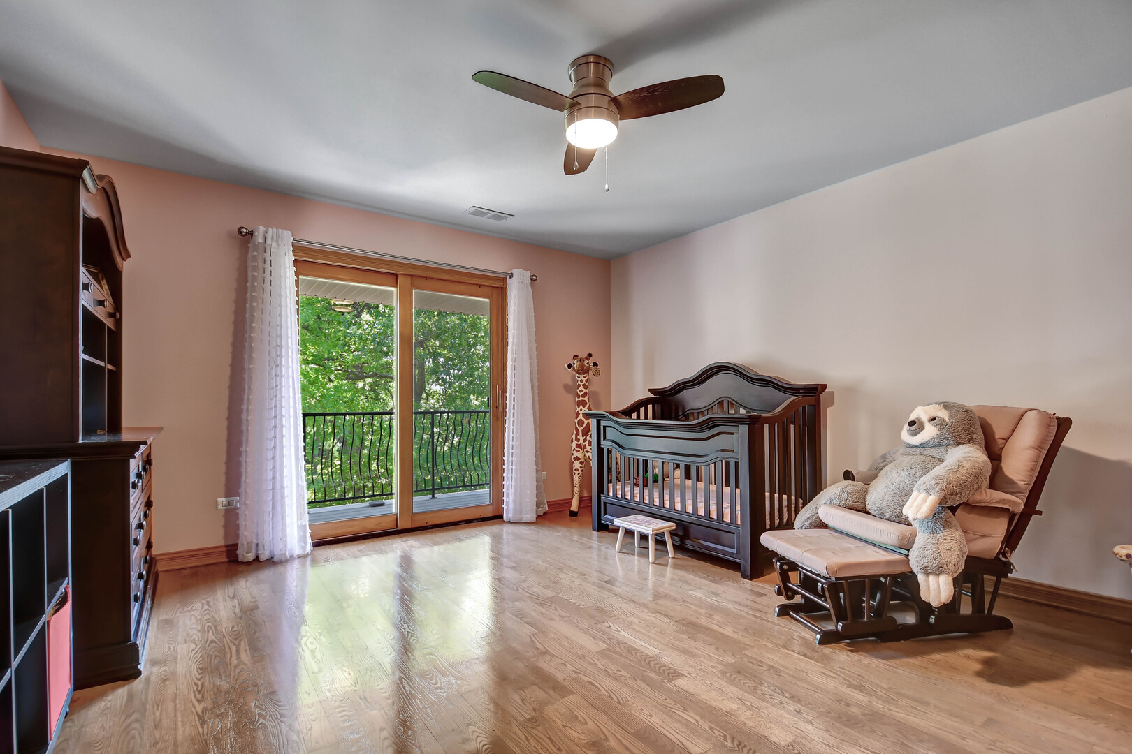 1383 Gordon Lane Lemont, IL 60439 - Photo 32 of 54 a living room with furniture and a flat screen tv