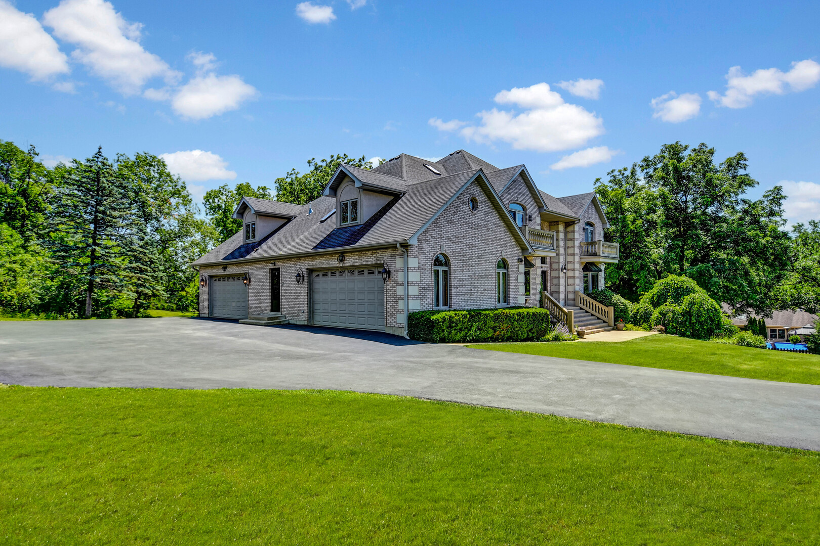 1383 Gordon Lane Lemont, IL 60439 - Photo 37 of 54 a front view of a house with a yard and garage