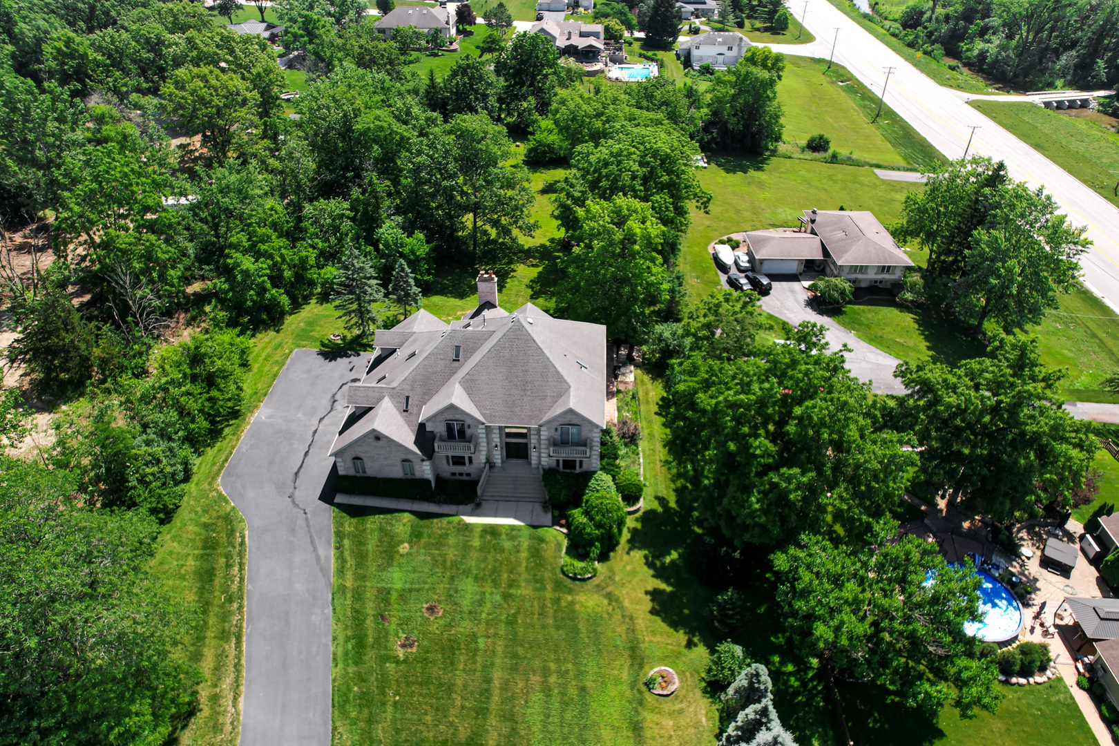 1383 Gordon Lane Lemont, IL 60439 - Photo 47 of 54 an aerial view of a house with swimming pool outdoor seating and yard