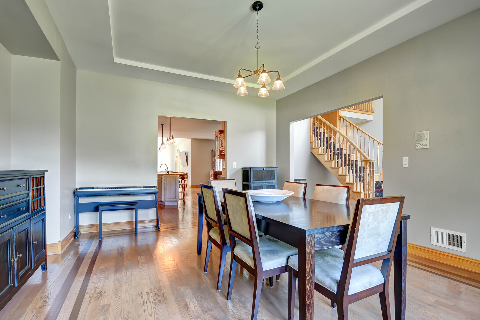 1383 Gordon Lane Lemont, IL 60439 - Photo 6 of 54 a view of a dining room with furniture window and wooden floor