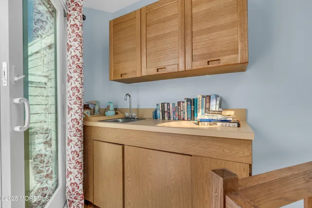 a view of swimming pool with outdoor seating