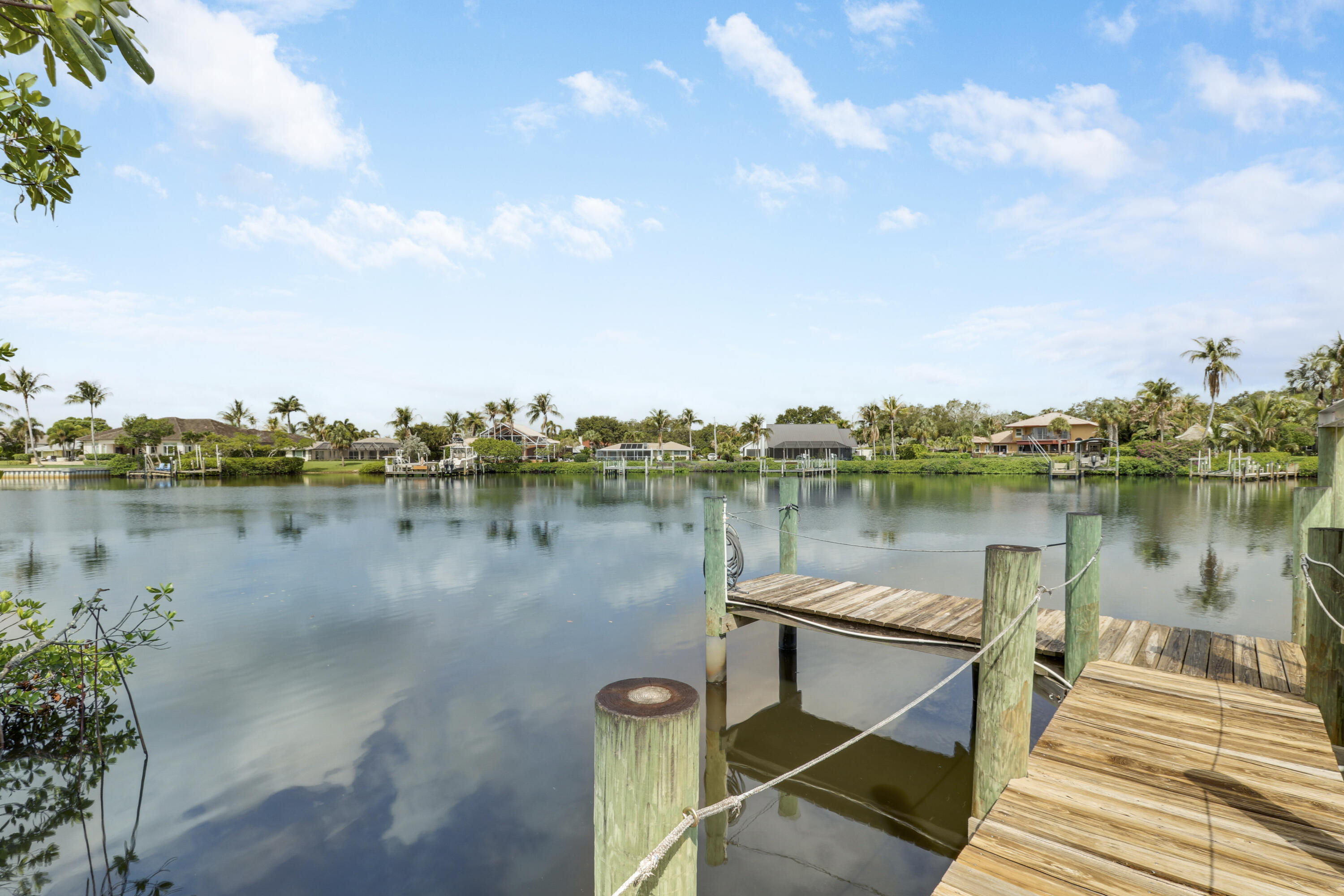 18791 Southeast River Ridge Road Jupiter, FL 33469 - Photo 11 of 25 a view of a lake with a large mountain