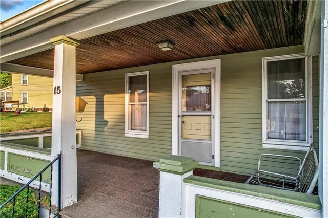 a front view of a house with a balcony