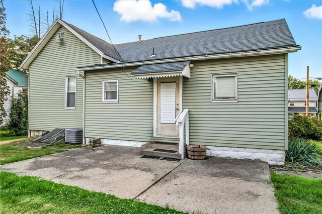 a view of a chairs in front of house