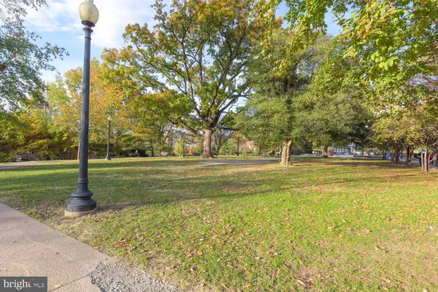 a view of street with sitting area