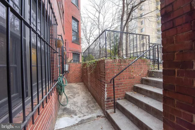 a view of a pathway with a building