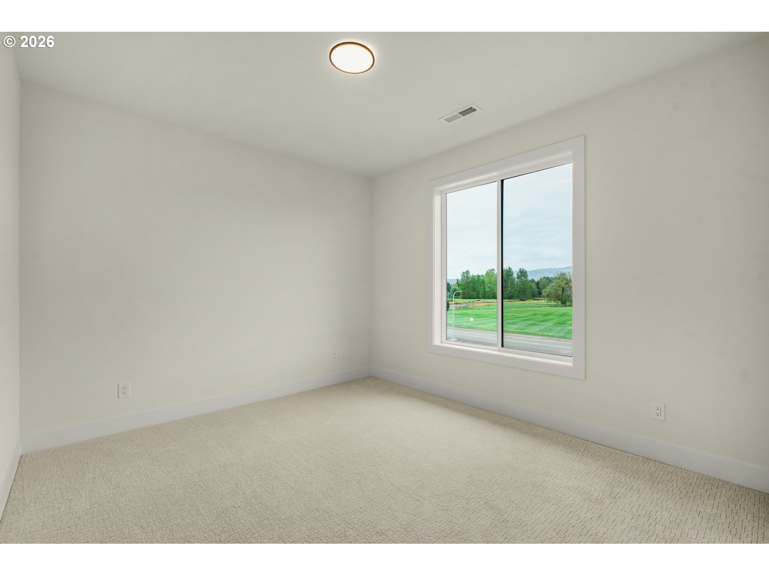 2040 South River Road Kelso, WA 98626 - Photo 28 of 43 a view of an empty room with a window