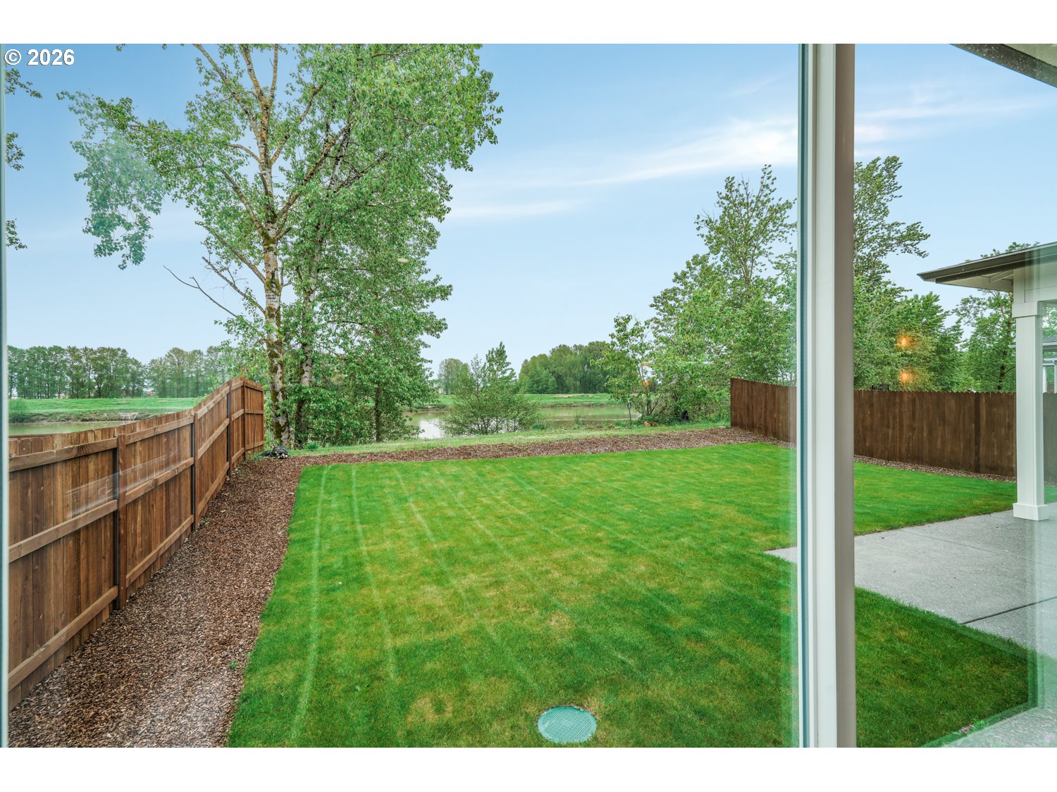 2040 South River Road Kelso, WA 98626 - Photo 34 of 43 a view of a backyard with mountain view and a lake view