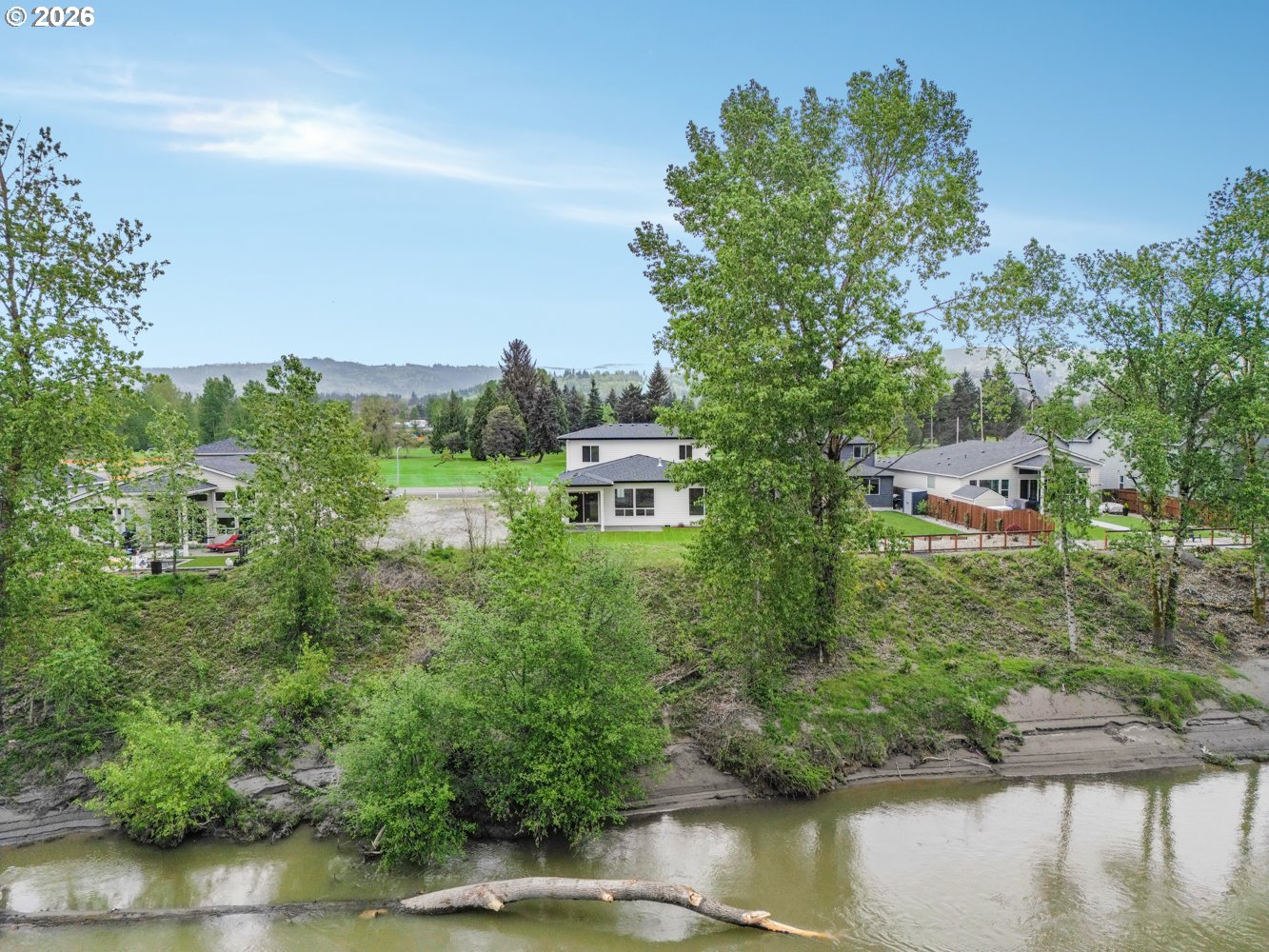 2040 South River Road Kelso, WA 98626 - Photo 37 of 43 a view of a lake with houses