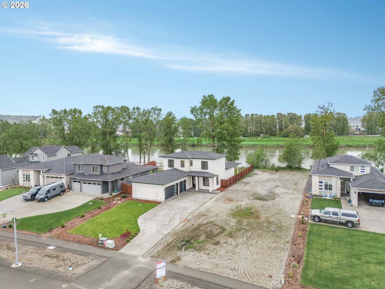 2040 South River Road Kelso, WA 98626 - Photo 41 of 43 a view of a swimming pool and trees in the background