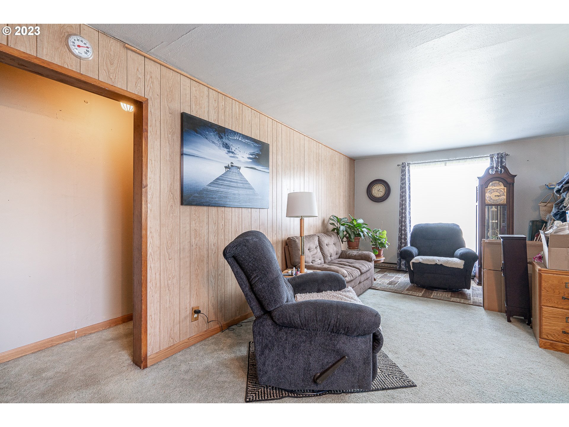 1639 F Street Springfield, OR 97477 - Photo 11 of 32 a living room with furniture and a window