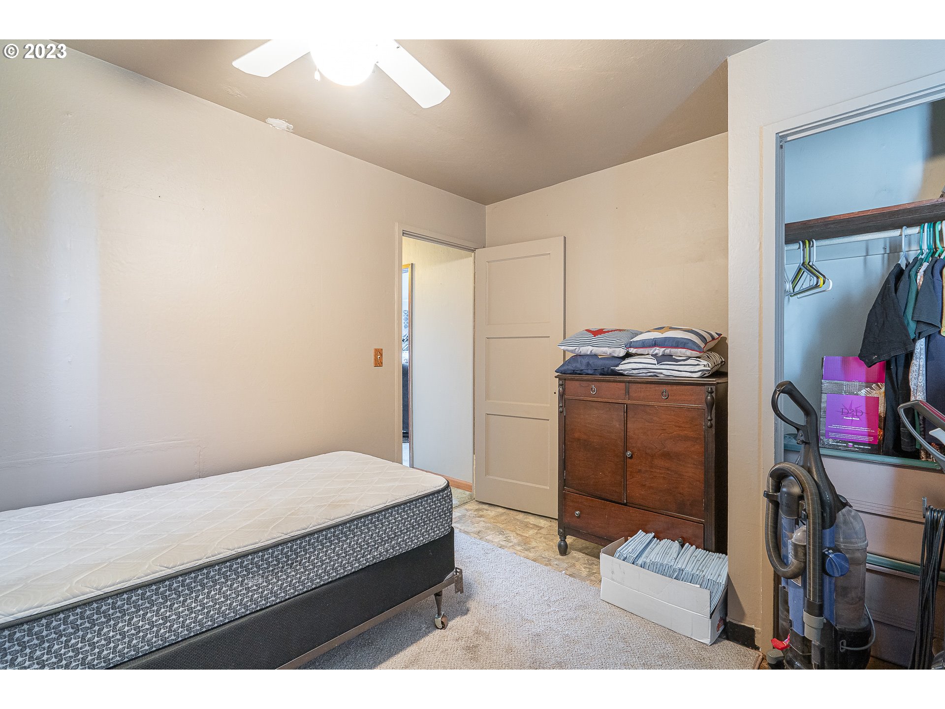 1639 F Street Springfield, OR 97477 - Photo 17 of 32 a bedroom with a bed and a tv in it