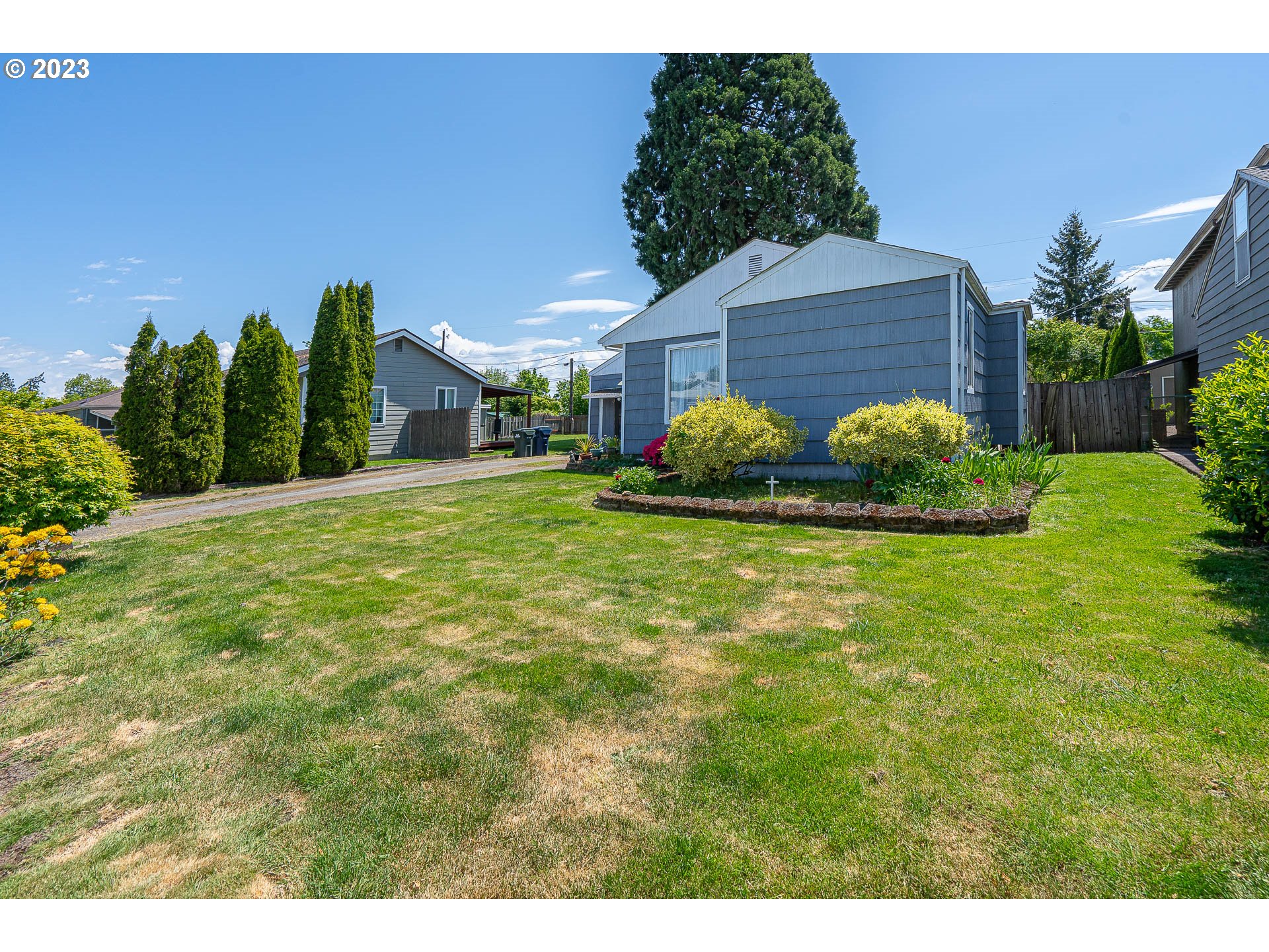 1639 F Street Springfield, OR 97477 - Photo 2 of 32 a view of a house with a yard