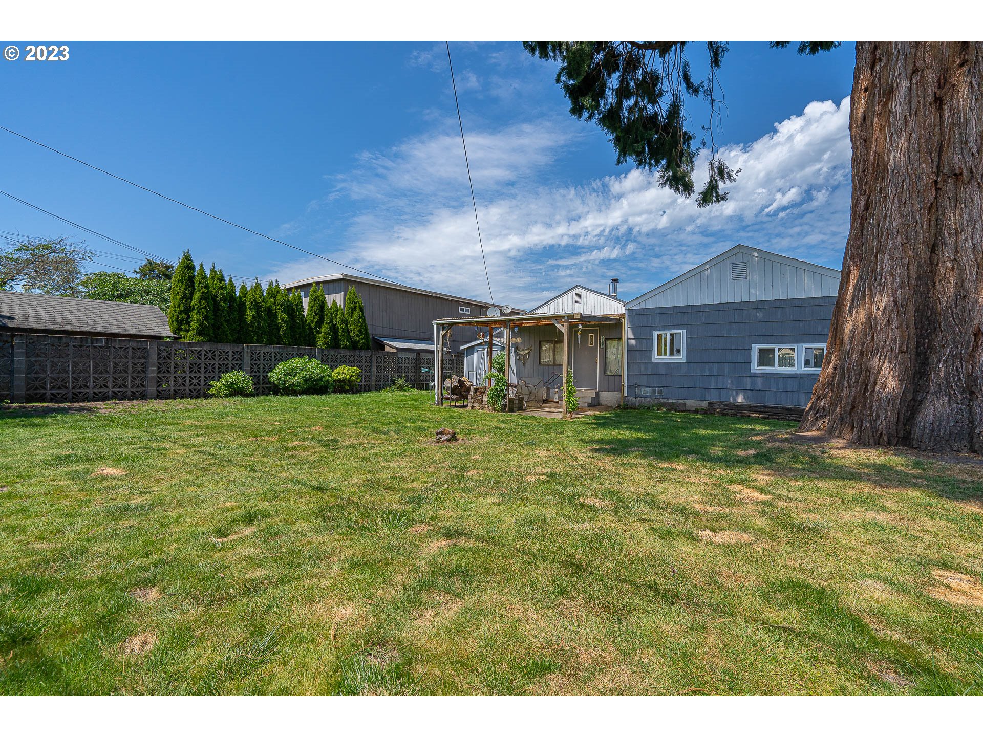 1639 F Street Springfield, OR 97477 - Photo 23 of 32 a view of a house with a yard