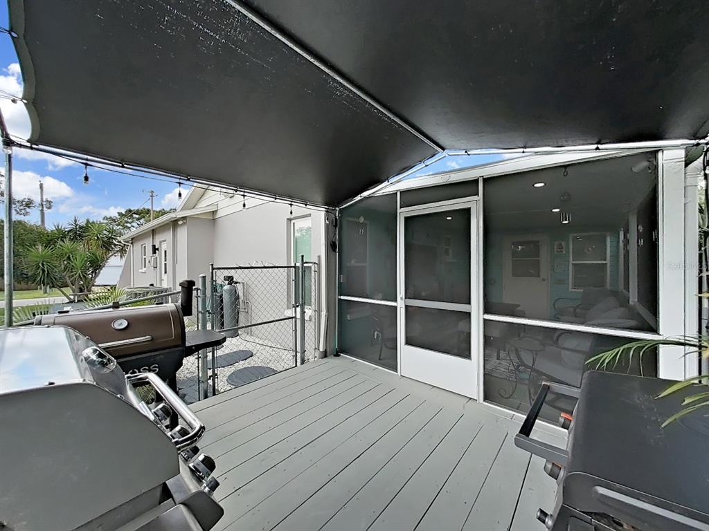 8527 Jolly Roger Drive Hudson, FL 34667 - Photo 21 of 39 a view of balcony deck and wooden floor