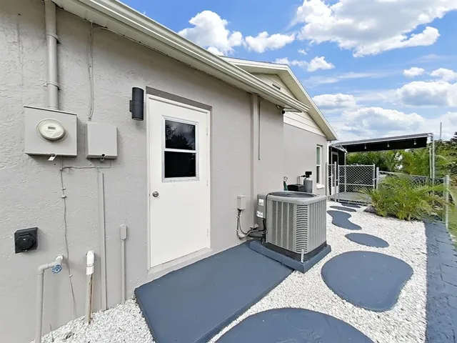 a view of outdoor kitchen and entertaining space