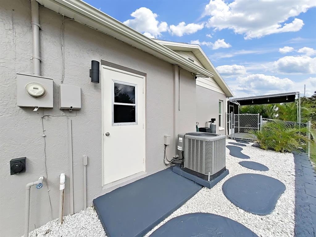 8527 Jolly Roger Drive Hudson, FL 34667 - Photo 32 of 39 a view of outdoor kitchen and entertaining space