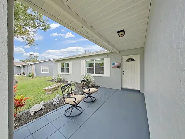 a house view with sitting space and garden space