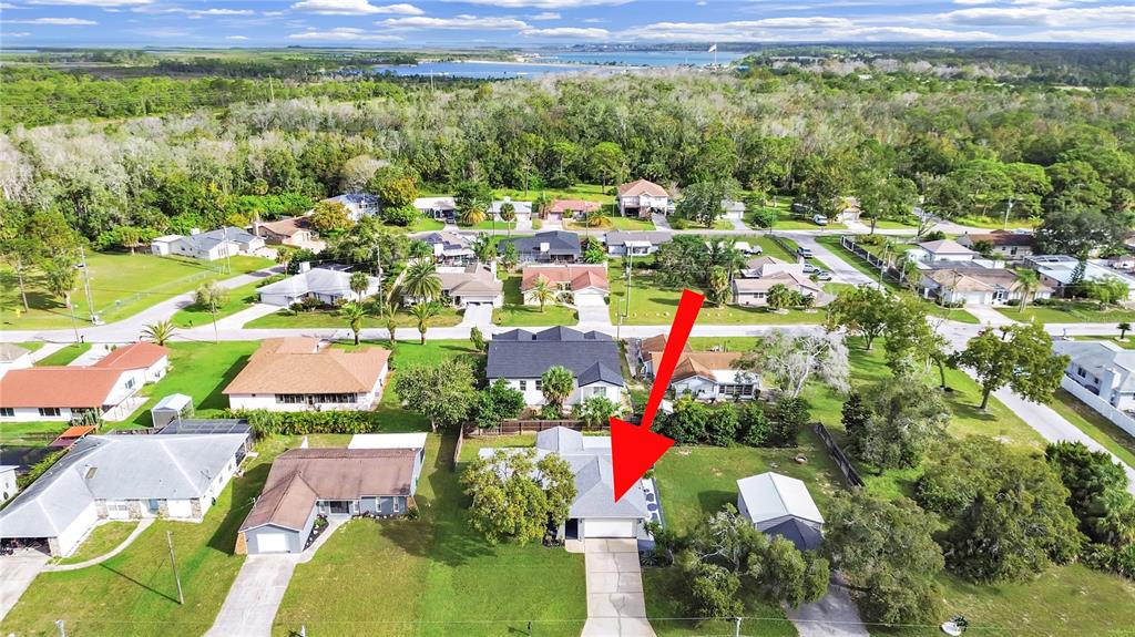 8527 Jolly Roger Drive Hudson, FL 34667 - Photo 39 of 39 a view of a city with lush green forest