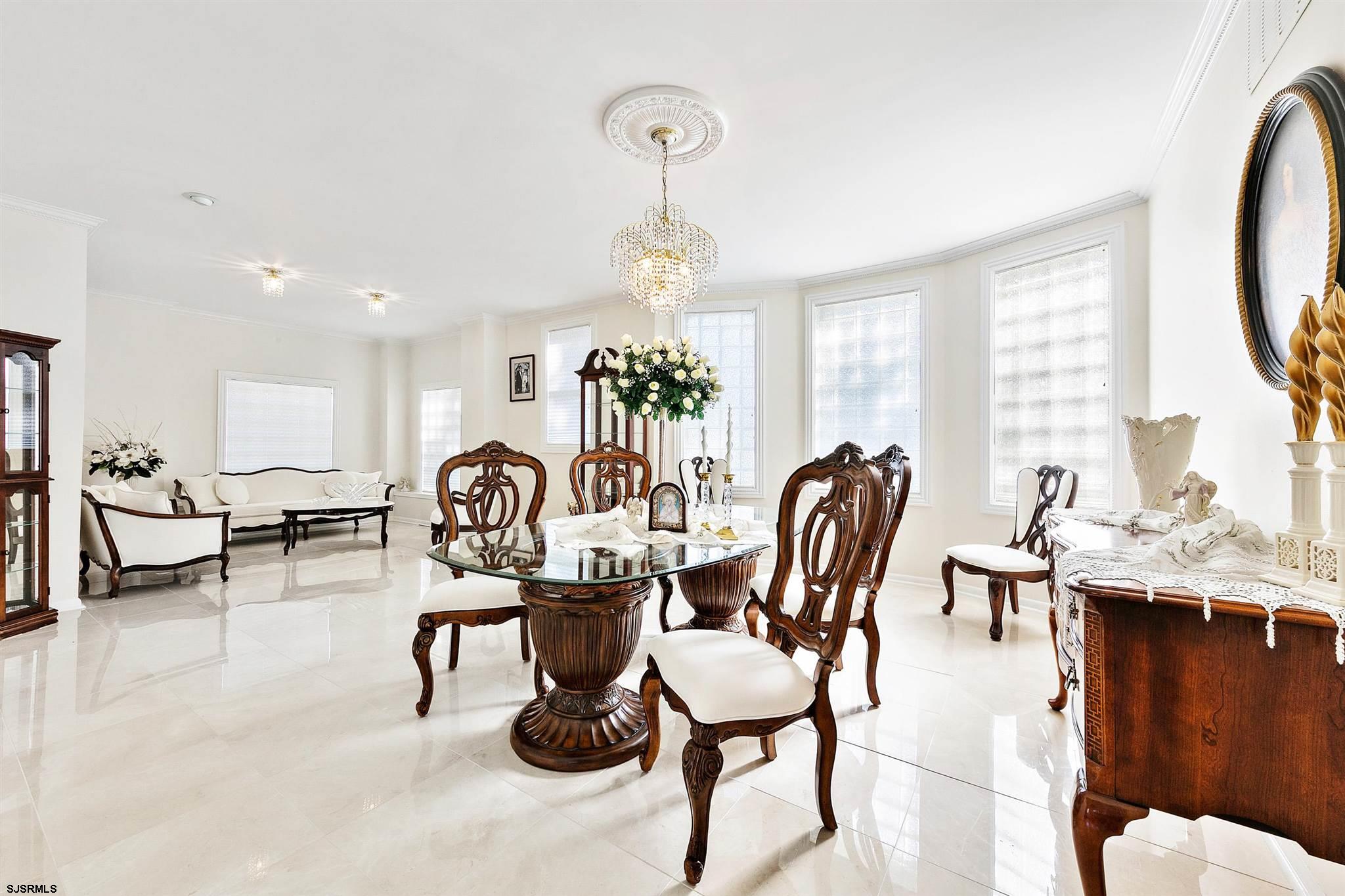1401 Shore Road Northfield, NJ 08225 - Photo 37 of 96 a view of a dining room with furniture window and outside view