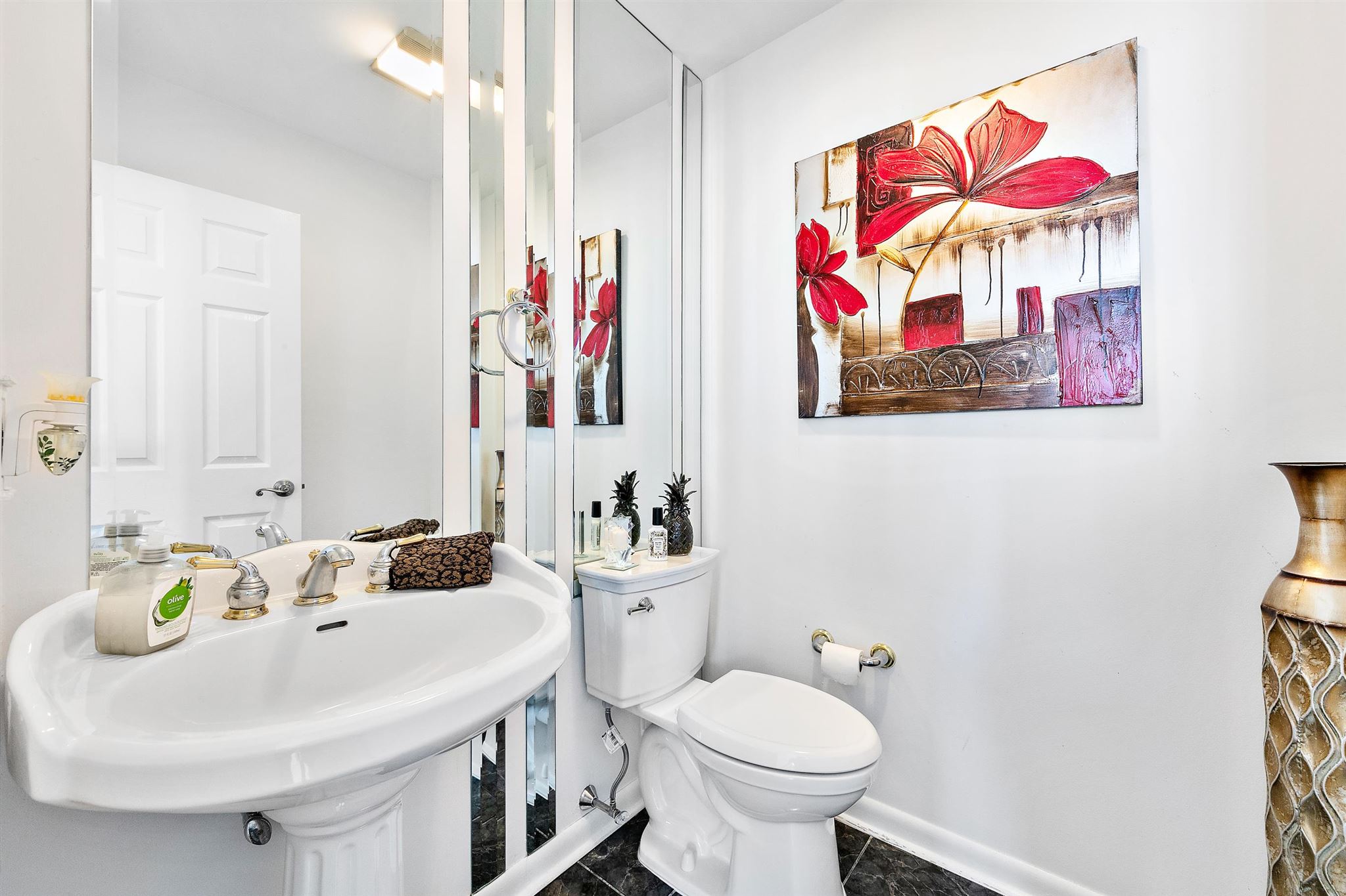 1401 Shore Road Northfield, NJ 08225 - Photo 40 of 96 a bathroom with a sink mirror and toilet