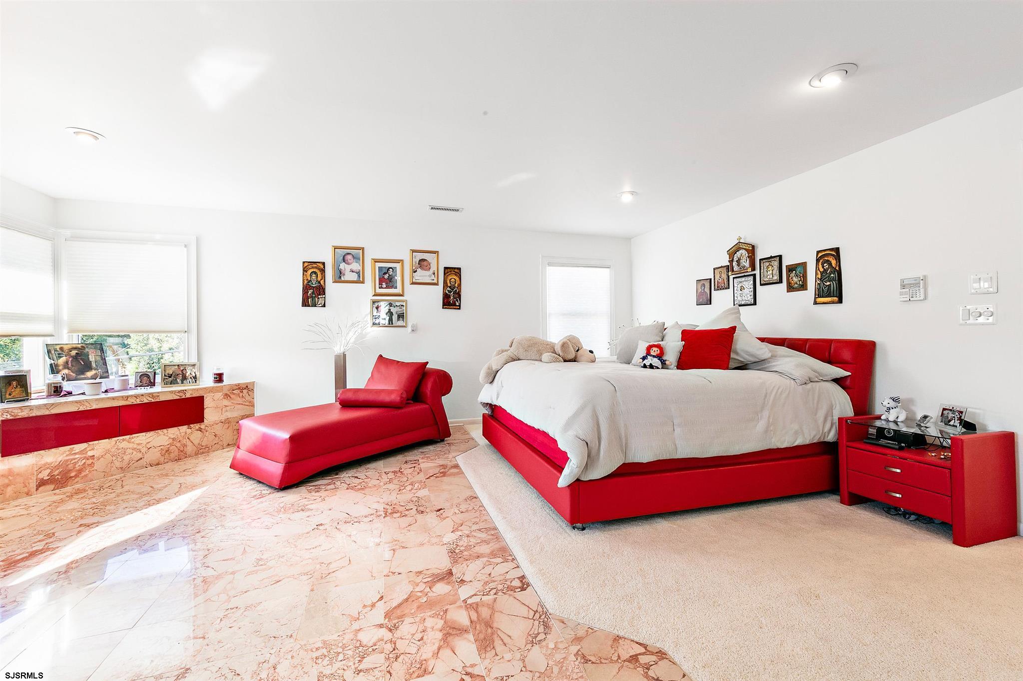 1401 Shore Road Northfield, NJ 08225 - Photo 42 of 96 a bedroom with bed and a couch