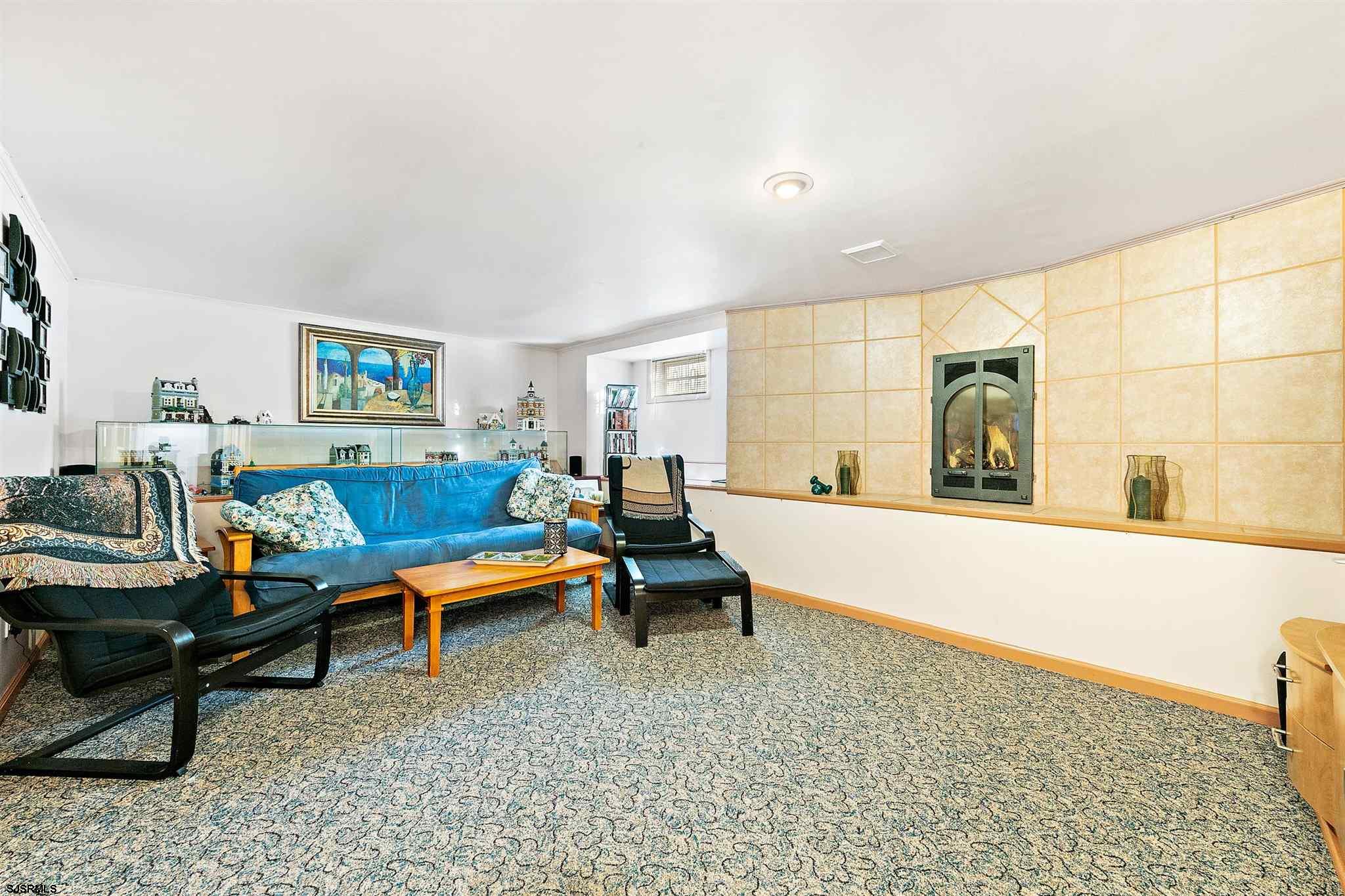 1401 Shore Road Northfield, NJ 08225 - Photo 69 of 96 a living room with furniture and a large window