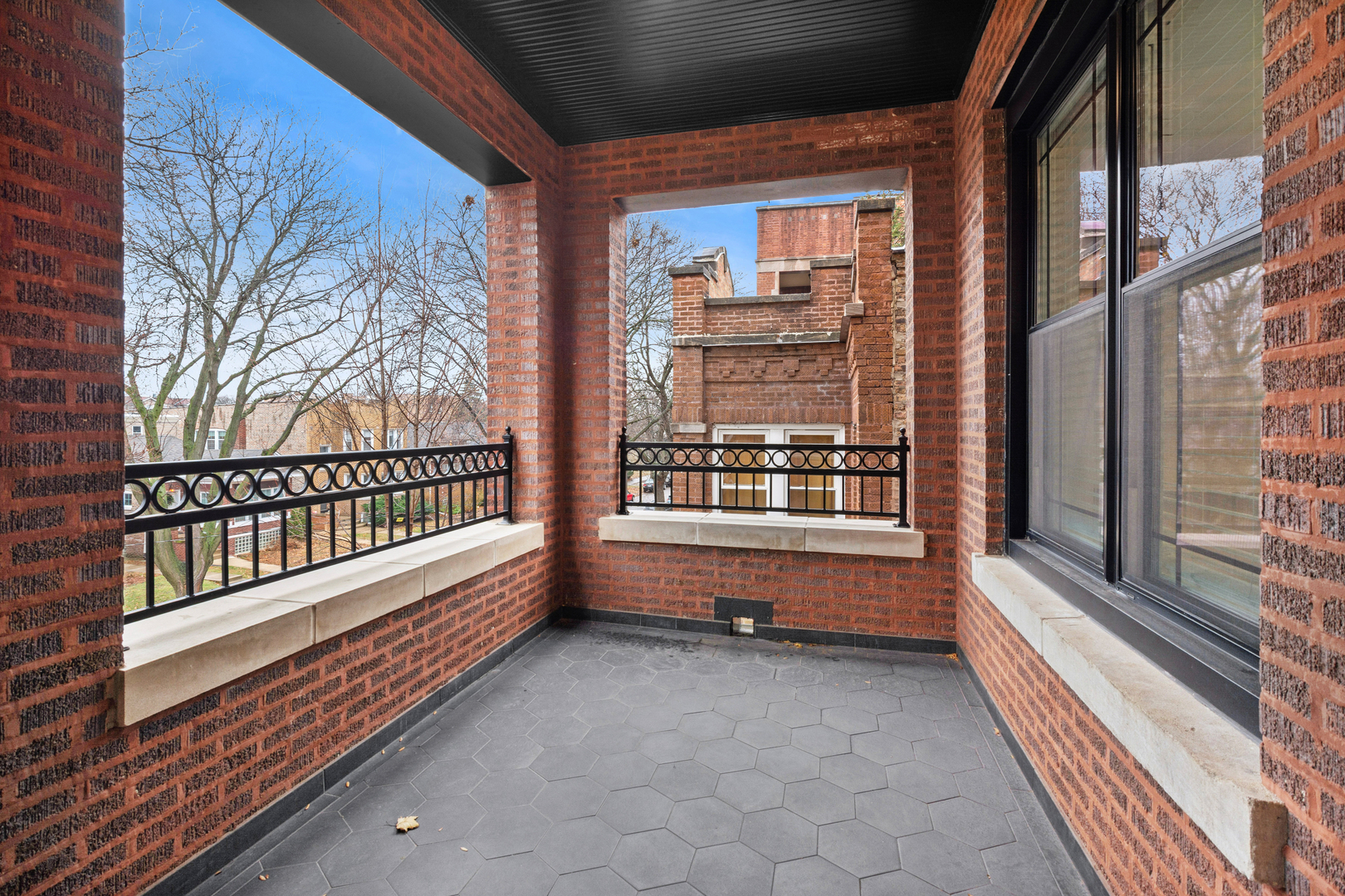 4932 North Ridgeway Avenue, Unit 2 Chicago, IL 60625 - Photo 8 of 21 a view of a house with a large window