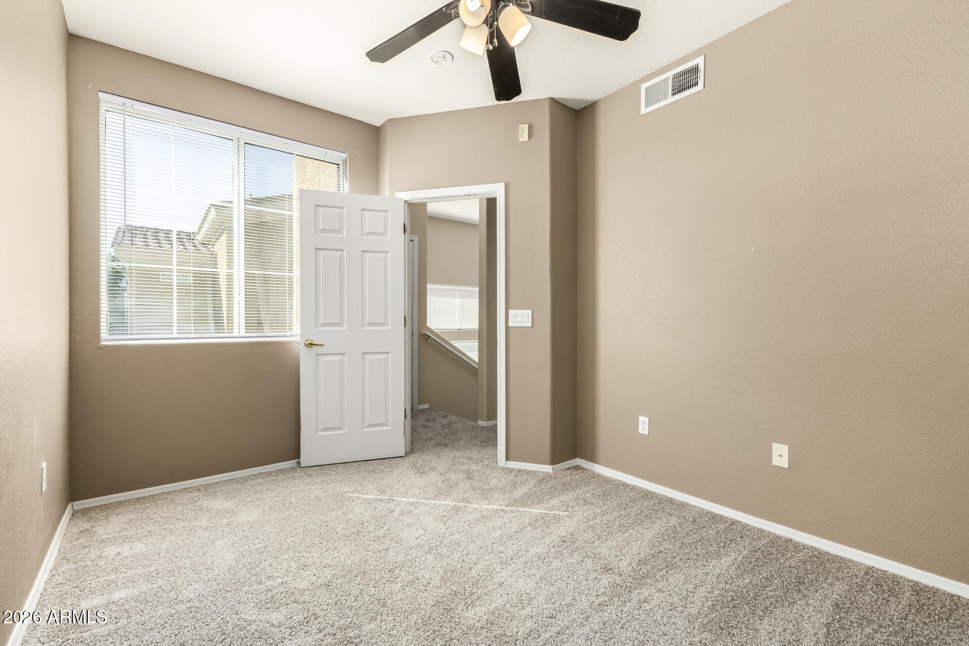 18250 North Cave Creek Road, Unit 198 Phoenix, AZ 85032 - Photo 12 of 30 a view of empty room with windows