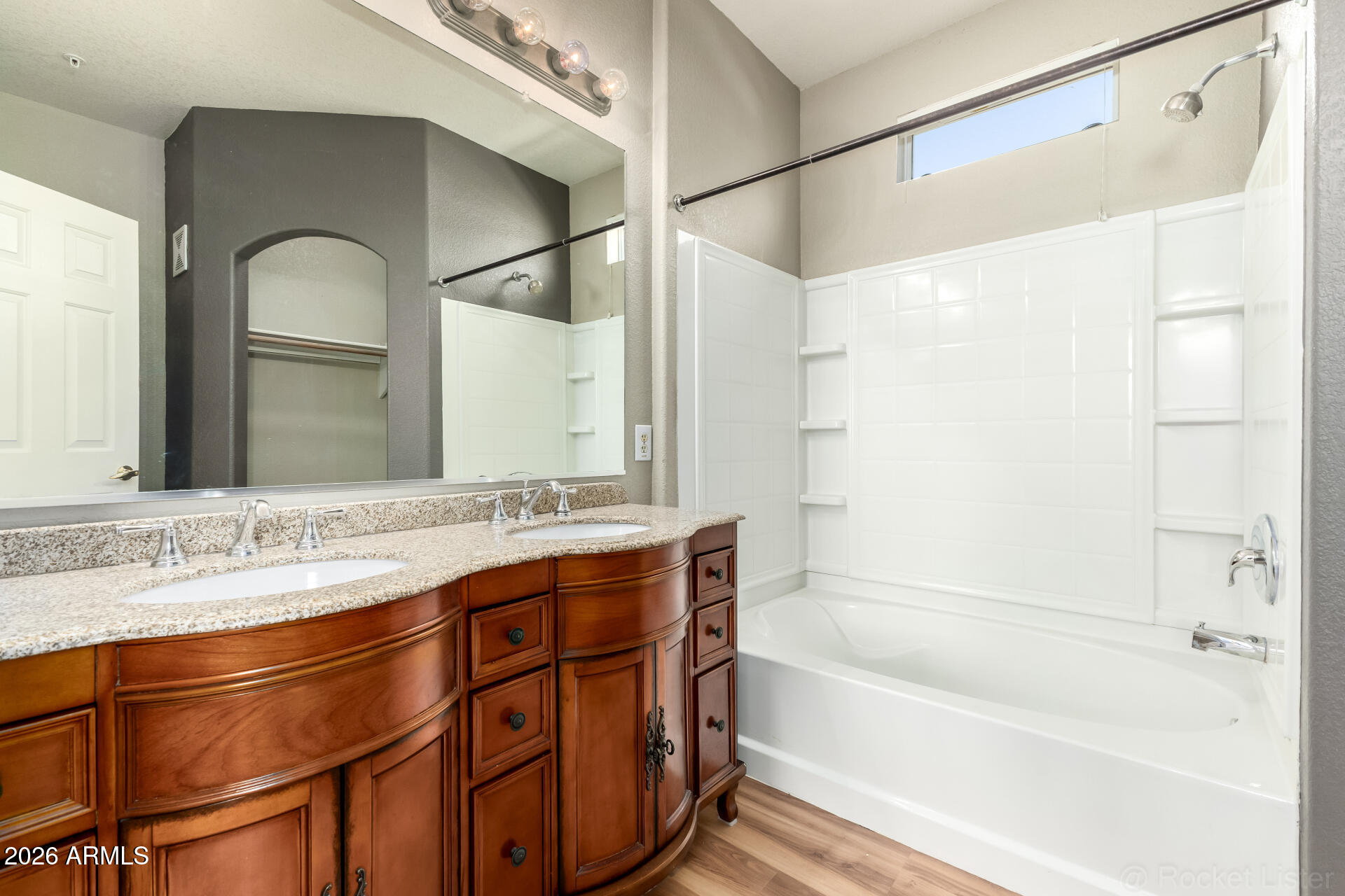 18250 North Cave Creek Road, Unit 198 Phoenix, AZ 85032 - Photo 13 of 30 a bathroom with a bathtub and a sink
