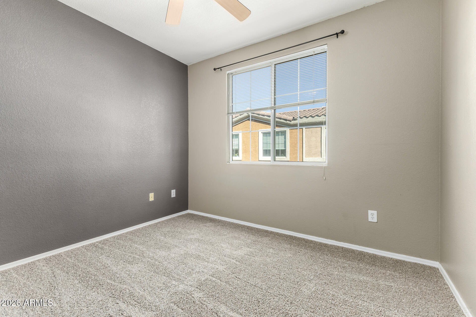 18250 North Cave Creek Road, Unit 198 Phoenix, AZ 85032 - Photo 14 of 30 an empty room with a window