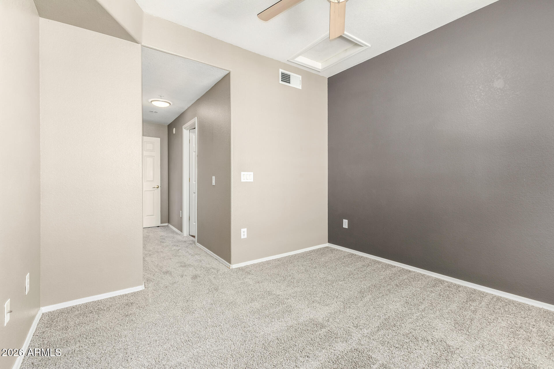 18250 North Cave Creek Road, Unit 198 Phoenix, AZ 85032 - Photo 15 of 30 an empty room with an entryway