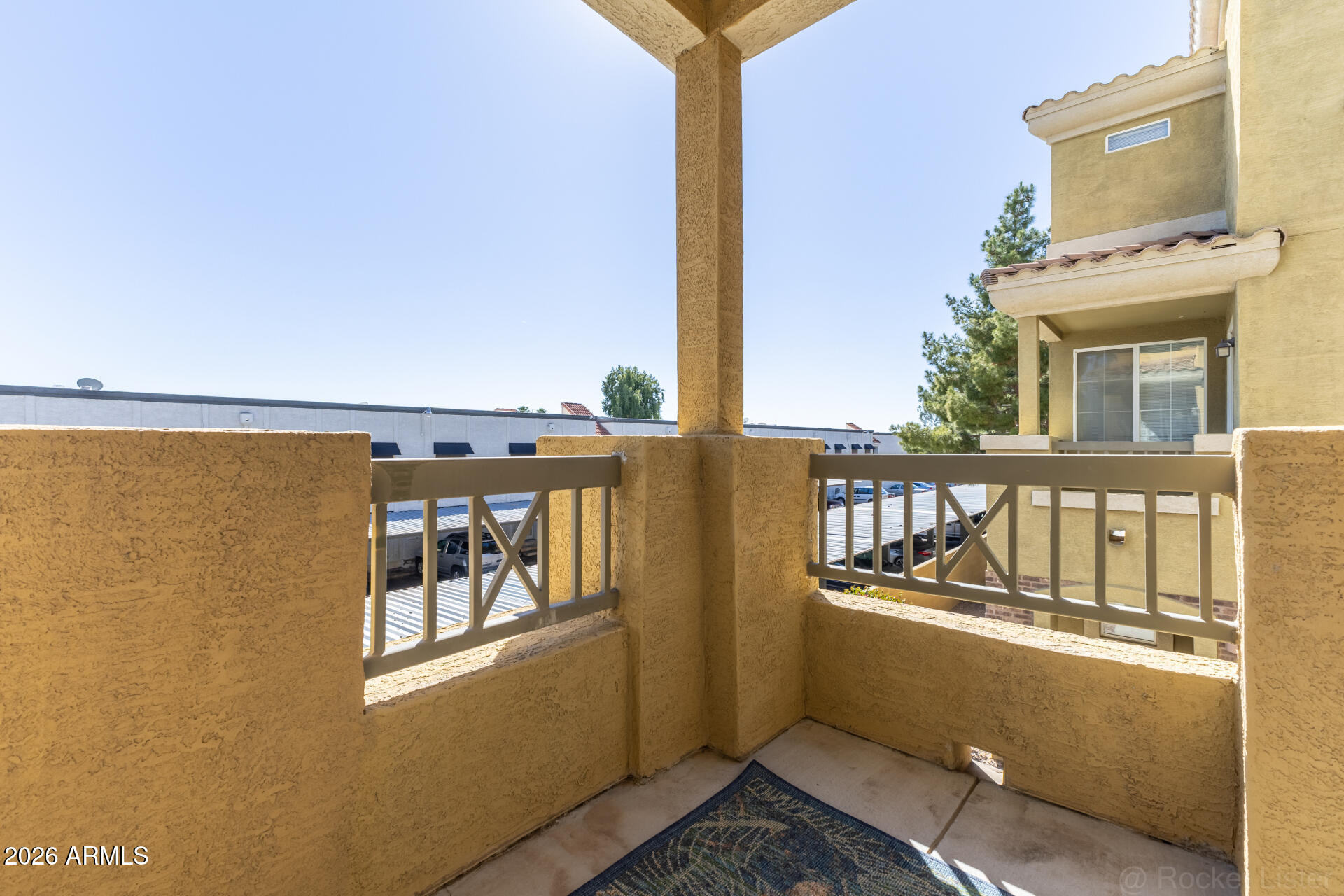 18250 North Cave Creek Road, Unit 198 Phoenix, AZ 85032 - Photo 25 of 30 a view of a balcony with furniture