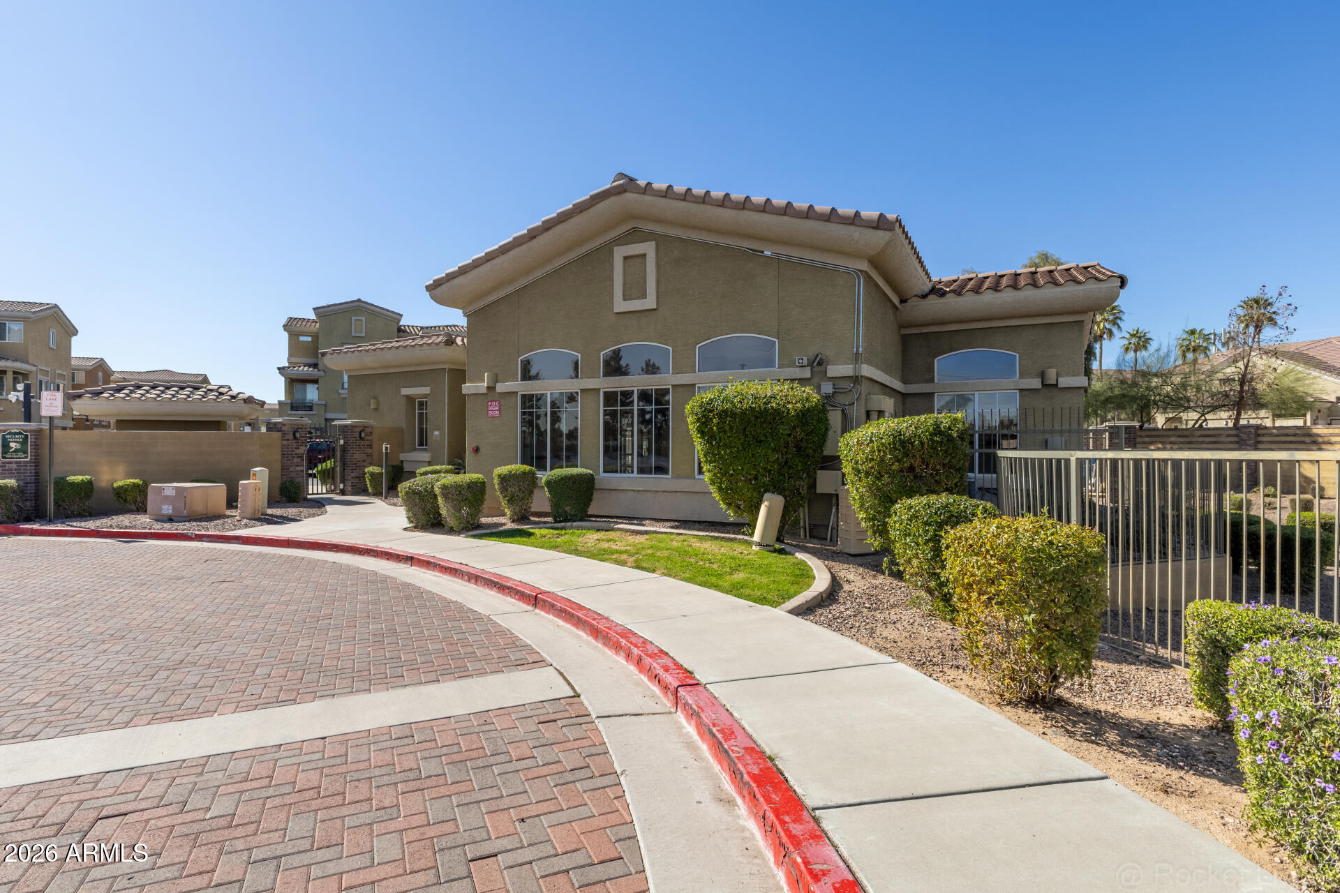 18250 North Cave Creek Road, Unit 198 Phoenix, AZ 85032 - Photo 27 of 30 a front view of a house with a porch