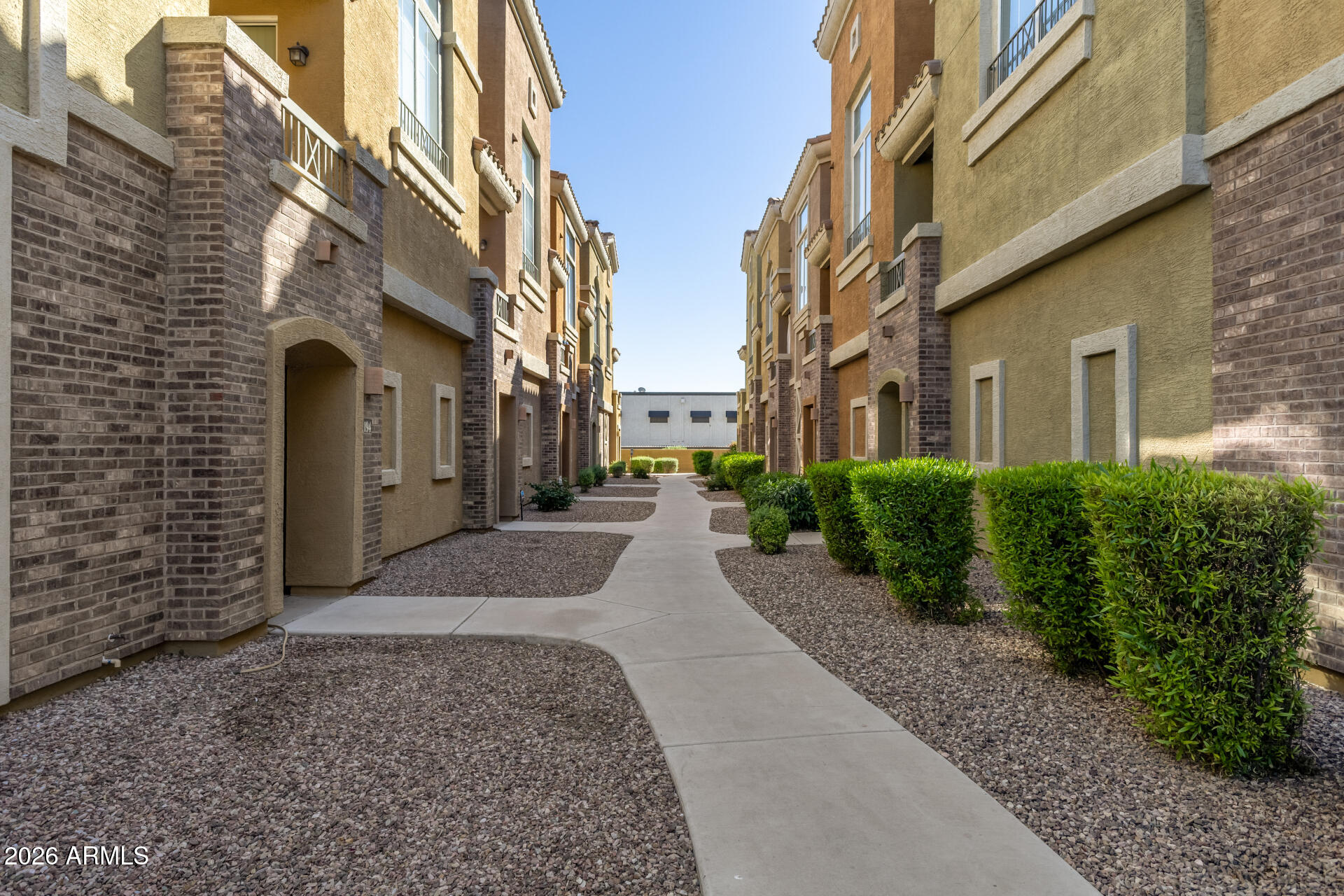 18250 North Cave Creek Road, Unit 198 Phoenix, AZ 85032 - Photo 30 of 30 a view of a pathway both side of building