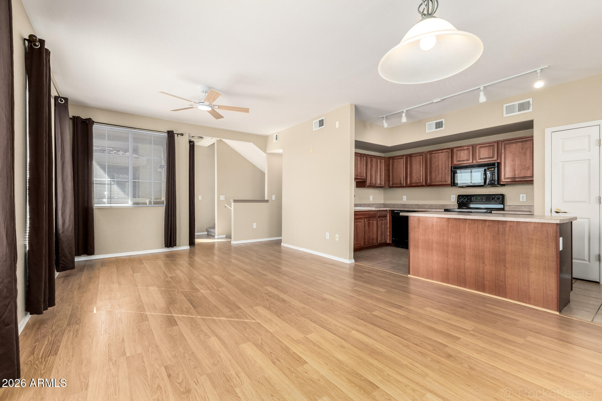 18250 North Cave Creek Road, Unit 198 Phoenix, AZ 85032 - Photo 4 of 30 a view of kitchen with sink and cabinets